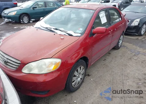 2003 Toyota Corolla Le z USA, uszkodzony, nr VIN JTDBR32EX32007104